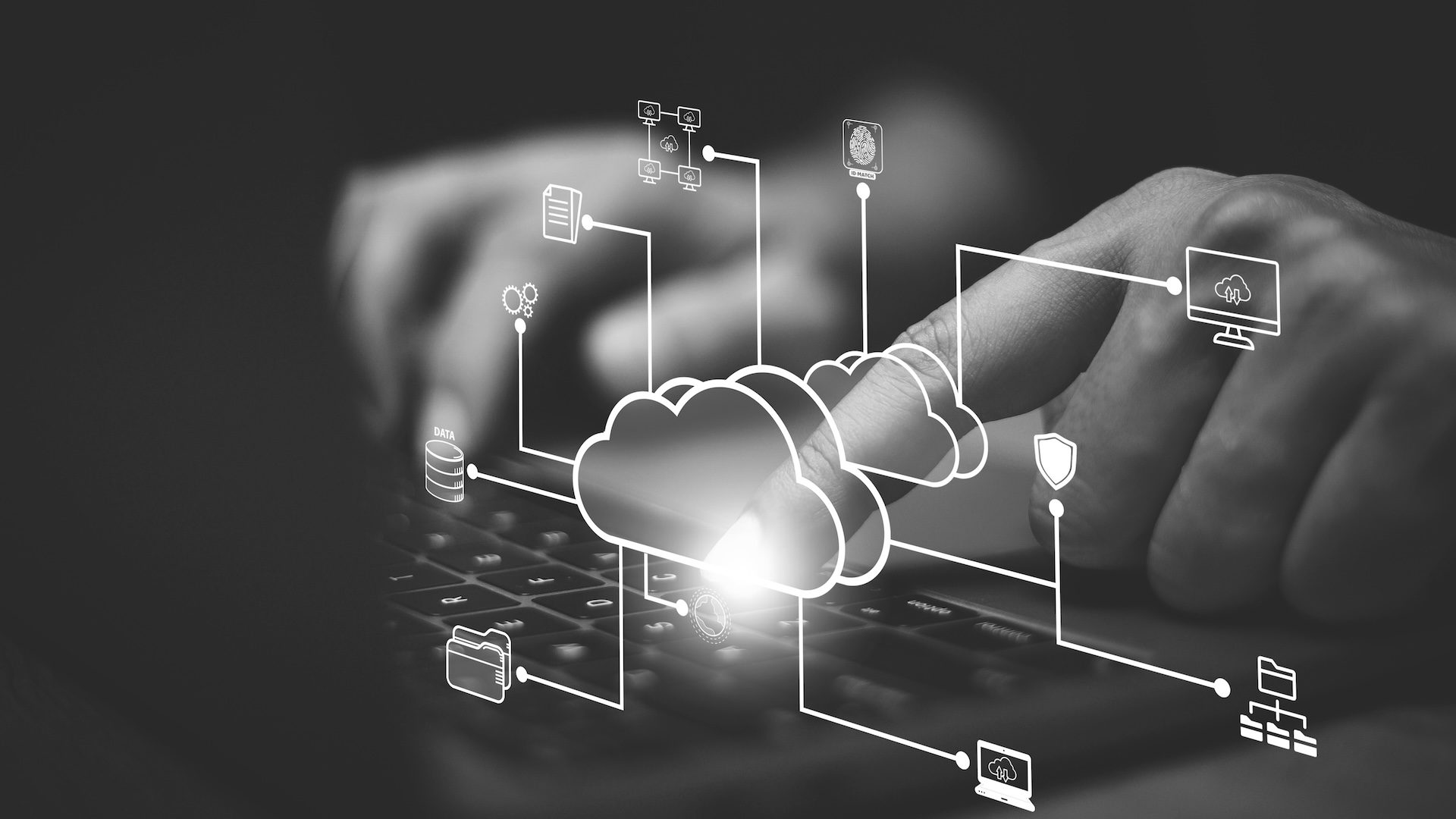 Business professional interacting with cloud computing interface representing data storage, cloud migration, and managed IT services