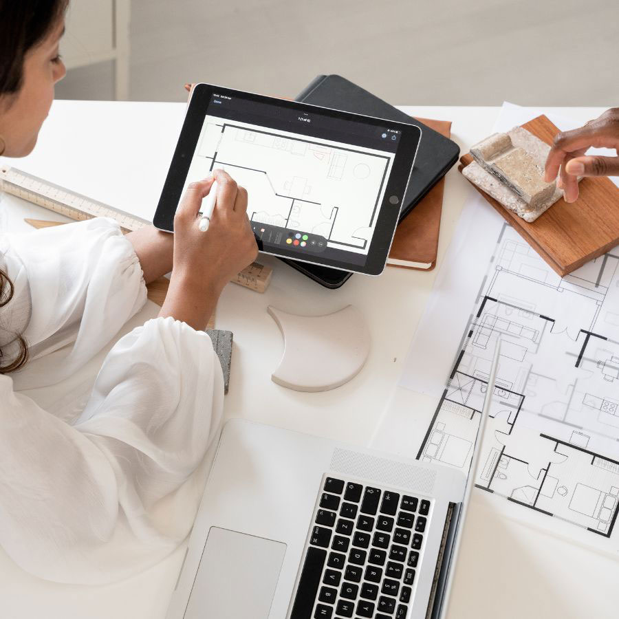 Image of team in architectural firm collaborating